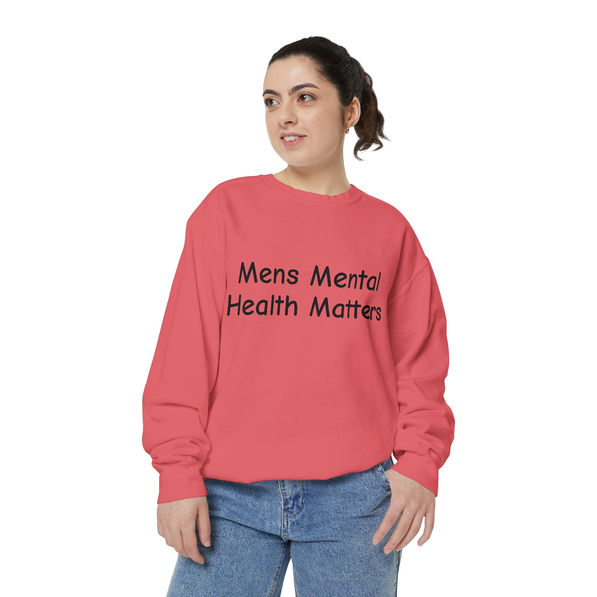 Person wearing a pink sweatshirt with Mental health matters 